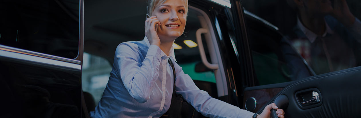Woman getting out of a private ride in Seattle