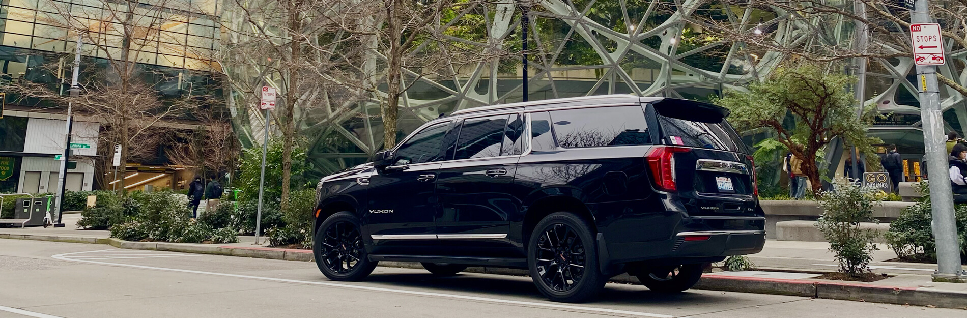 Starline's luxury SUV parked by the Amazon Spheres in downtown Seattle