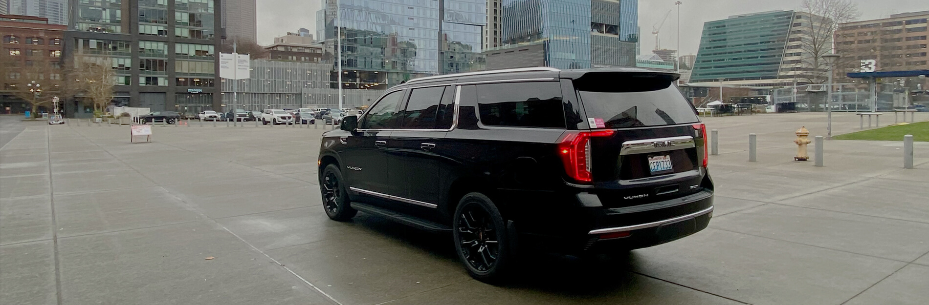 Starline's black limo driving through downtown Seattle