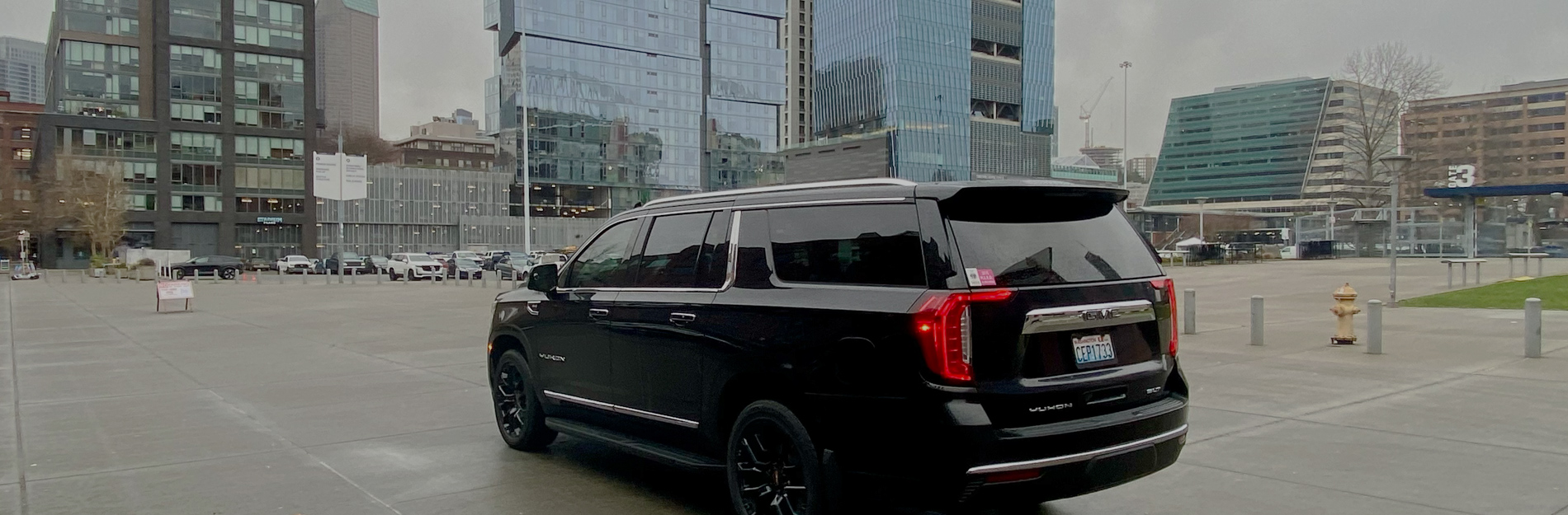 Our large black SUV providing limo service in downtown Seattle