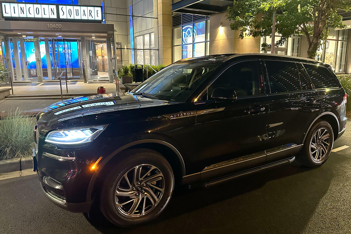 Our Black Lincoln Aviator picking up passengers at Lincoln Square in Bellevue WA