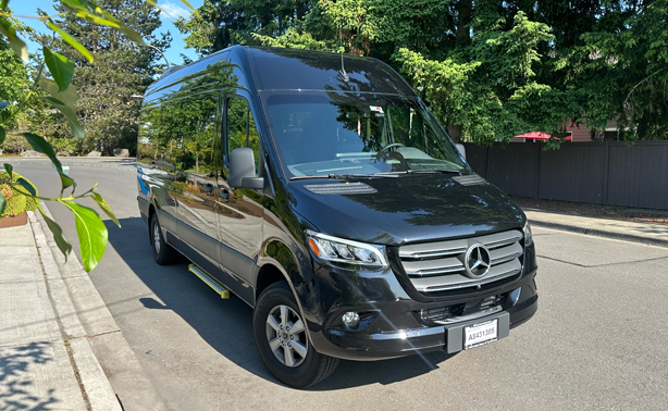 Starline's luxury van picking up passengers for prom luxury limo transportation near Seattle