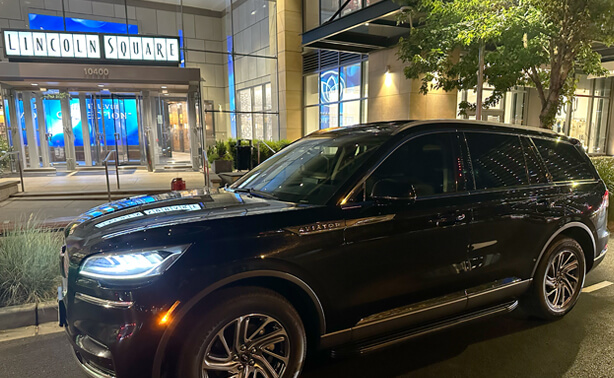 Starline's black SUV picking up passengers from a special night out at Lincoln Square
