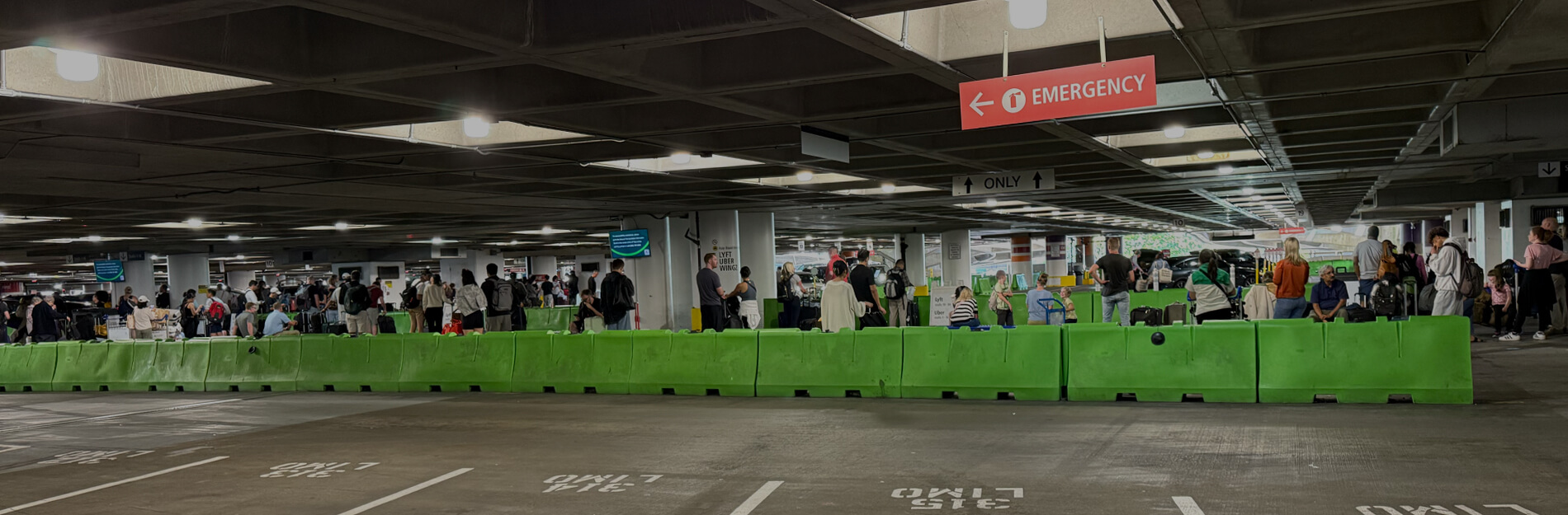 Long ride share line in SeaTac airport