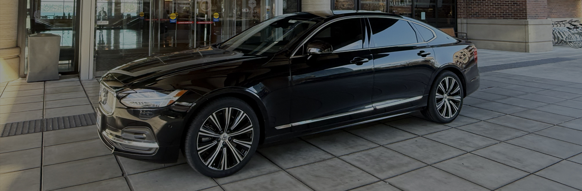 Starline's black car service, chauffeur waiting to pick up a passenger in front of Hyatt Regency Lake Washington