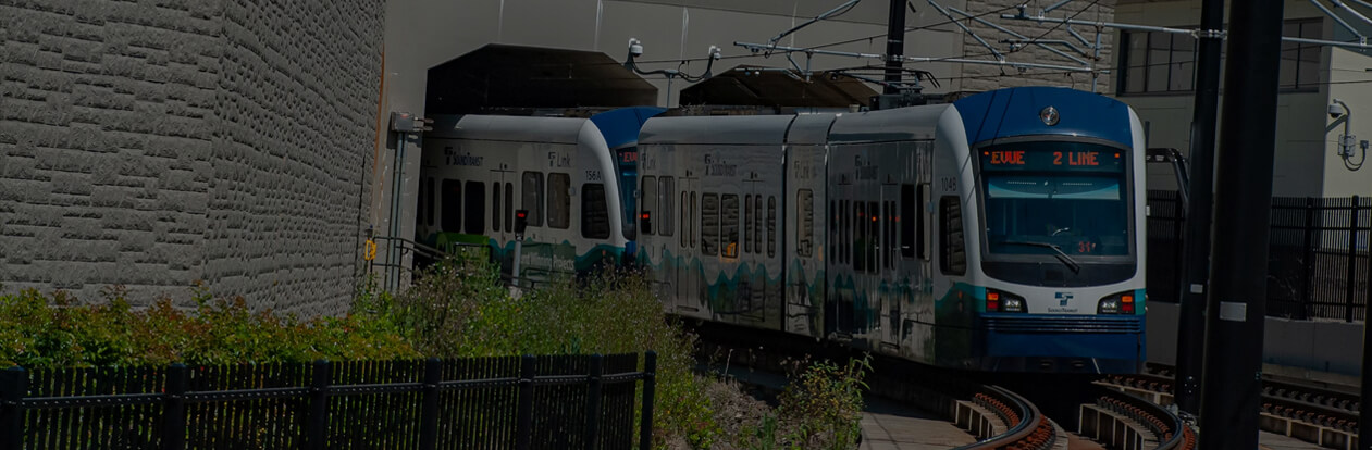 Sound Transit 2 Line light rail train rounding a curve on the Eastside route