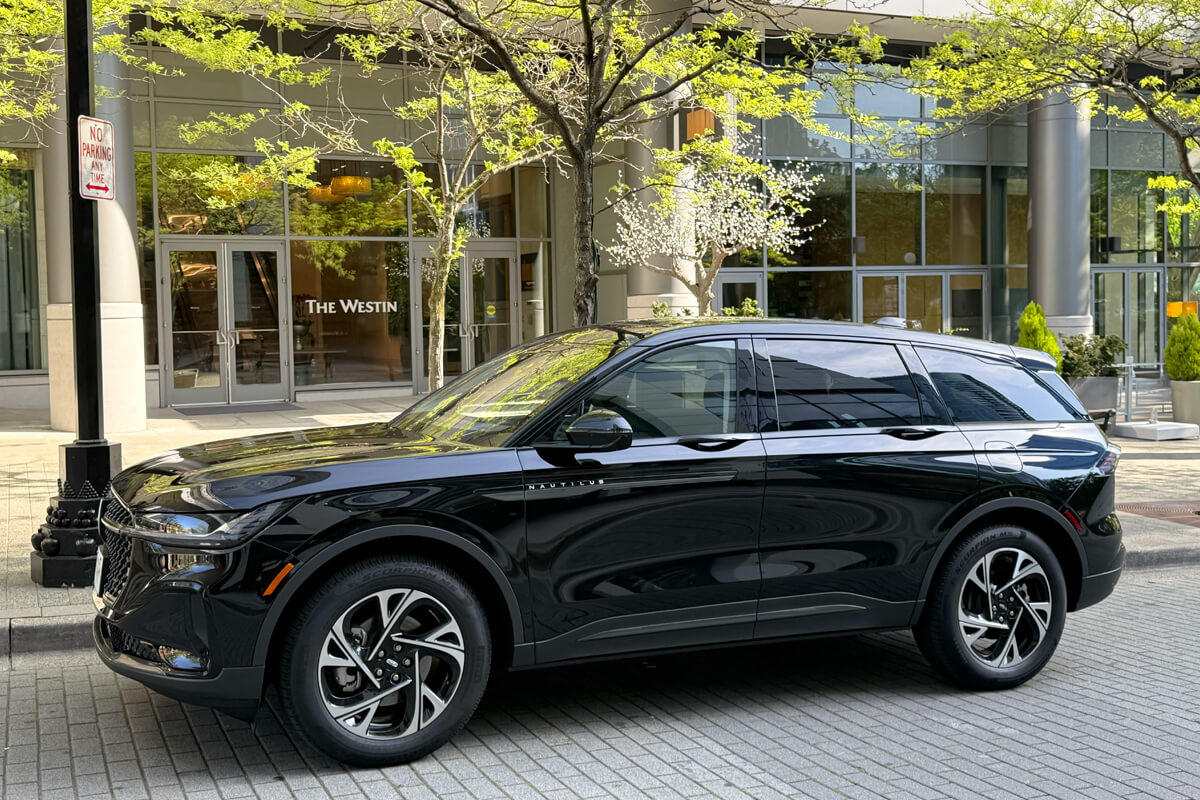 Black Lincoln SUV parked outside The Westin for hotel pickup