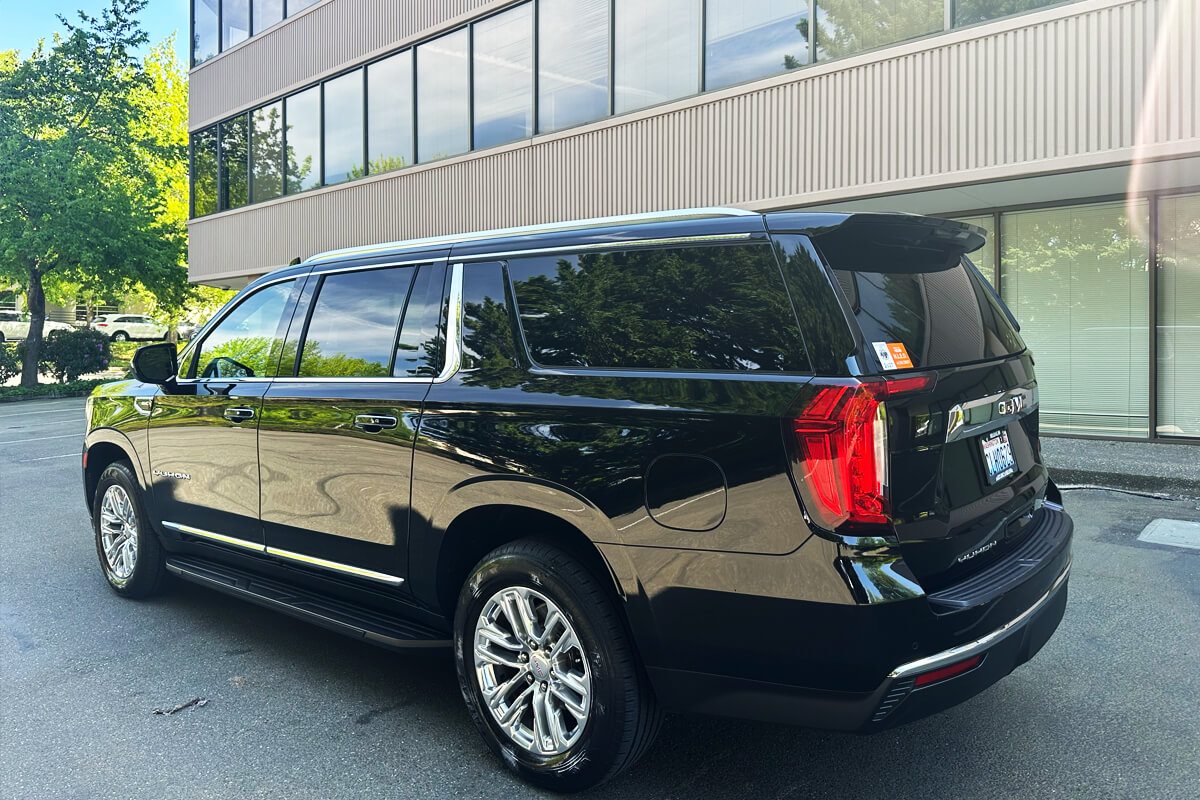 Black SUV for executive transportation and coordinated business travel in Seattle