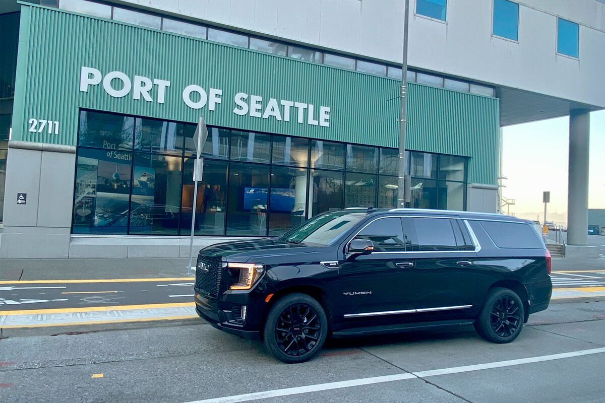 Black SUV outside Port of Seattle for private cruise transportation